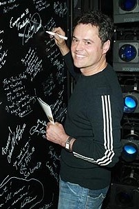 Photo Op - Donny Osmond & Ana Gasteyer at Mary Poppins - Donny Osmond (signs wall)