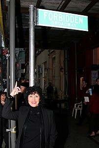Photo Op - Chita Rivera at Forbidden Broadway - Chita Rivera (pointing at sign)