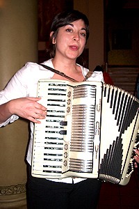 Photo Op - Holidays at Mary Poppins - accordian player
